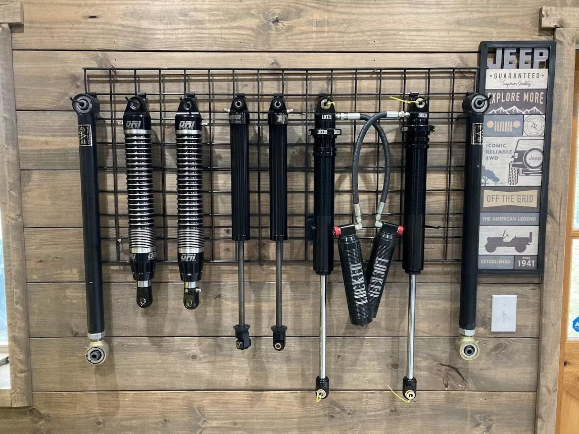There are many different types of shocks hanging on the wall.