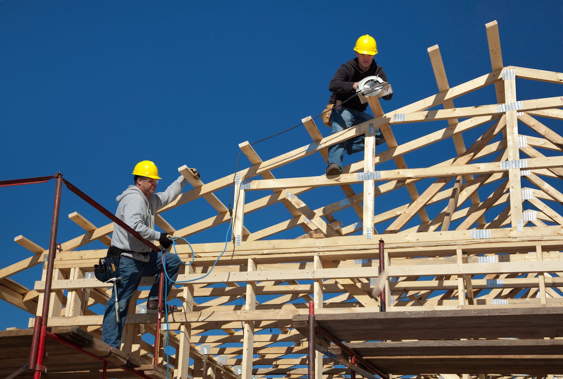 BornConstruction Pole Barn Builders working in a construction in Mauston, WI