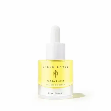 Green Envee Flora Elixir botanical eye serum in a yellow-and-white dropper bottle
