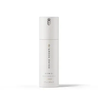 White cylindrical skincare bottle with silver cap on a white background