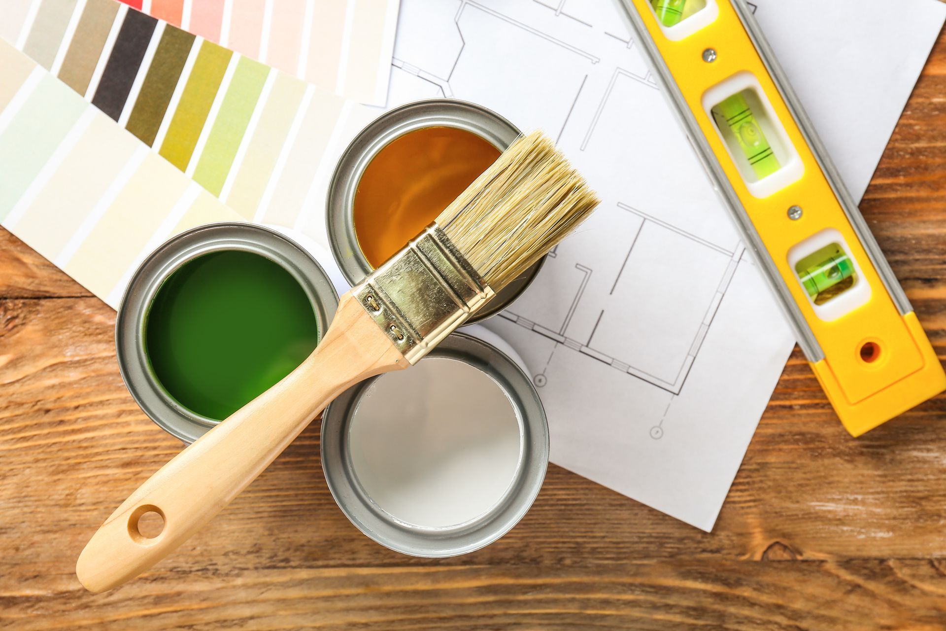 Cans of paint with supplies