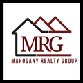 Logo for Mahogany Realty Group, featuring a house outline and overlapping roof peaks, with