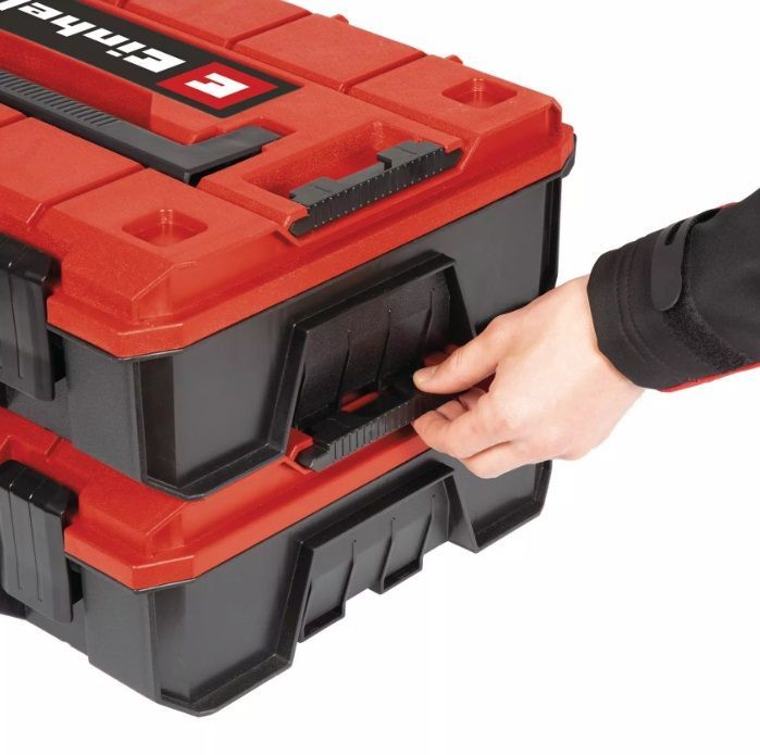Caja de herramientas Einhell de color rojo y negro con asa y pestillos.