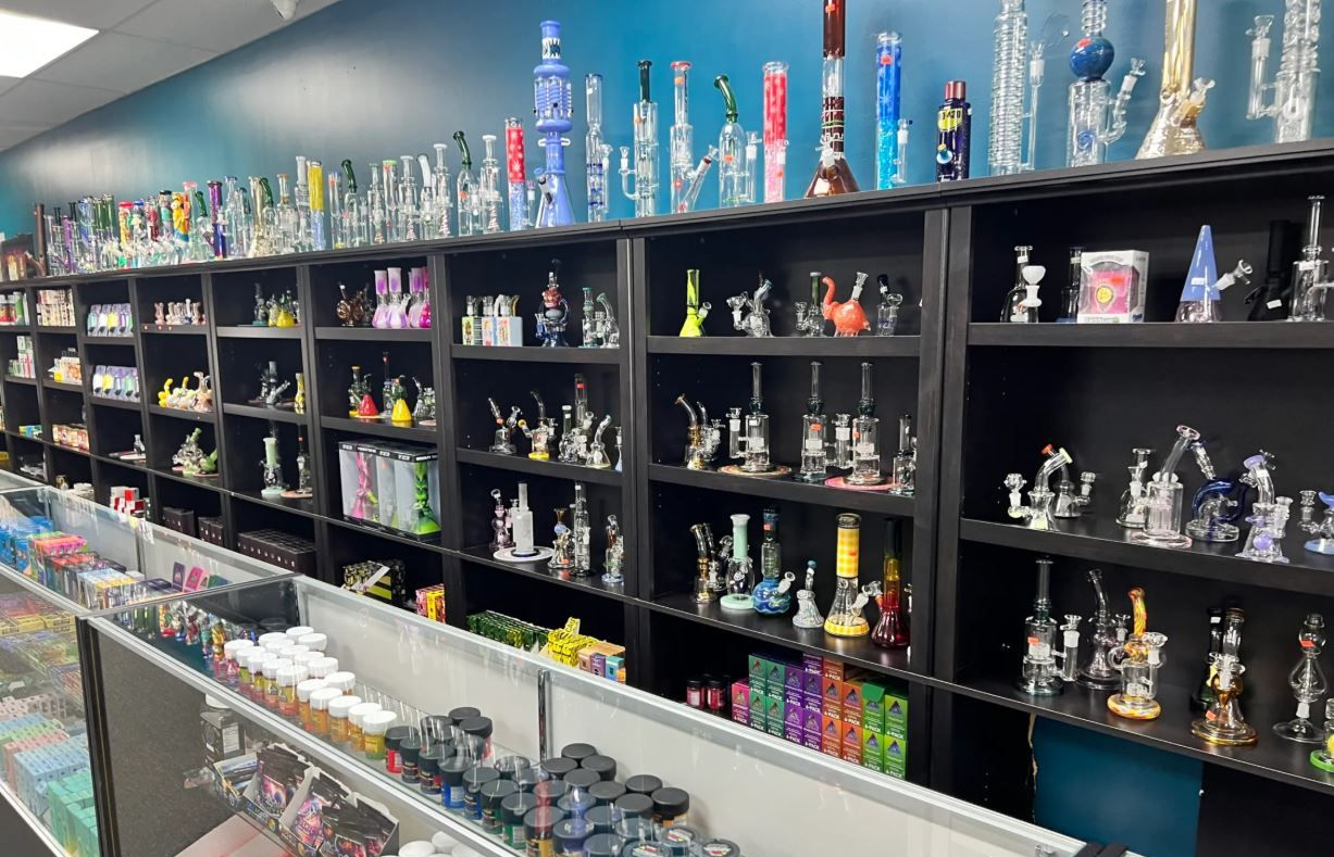 shop display featuring glass bongs and accessories for sale