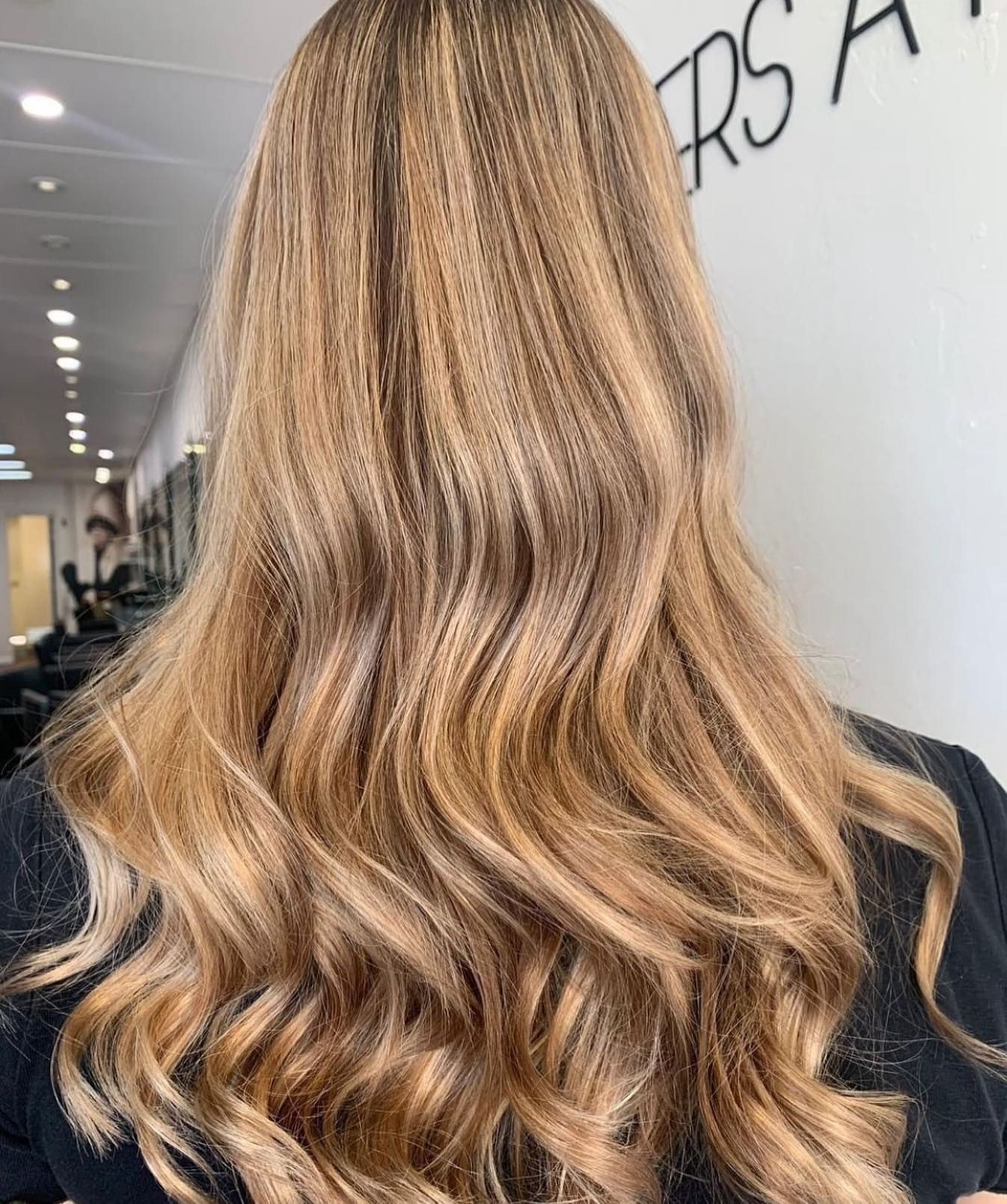 Blonde Hair — Hairdresser At Work in Cairns City, QLD