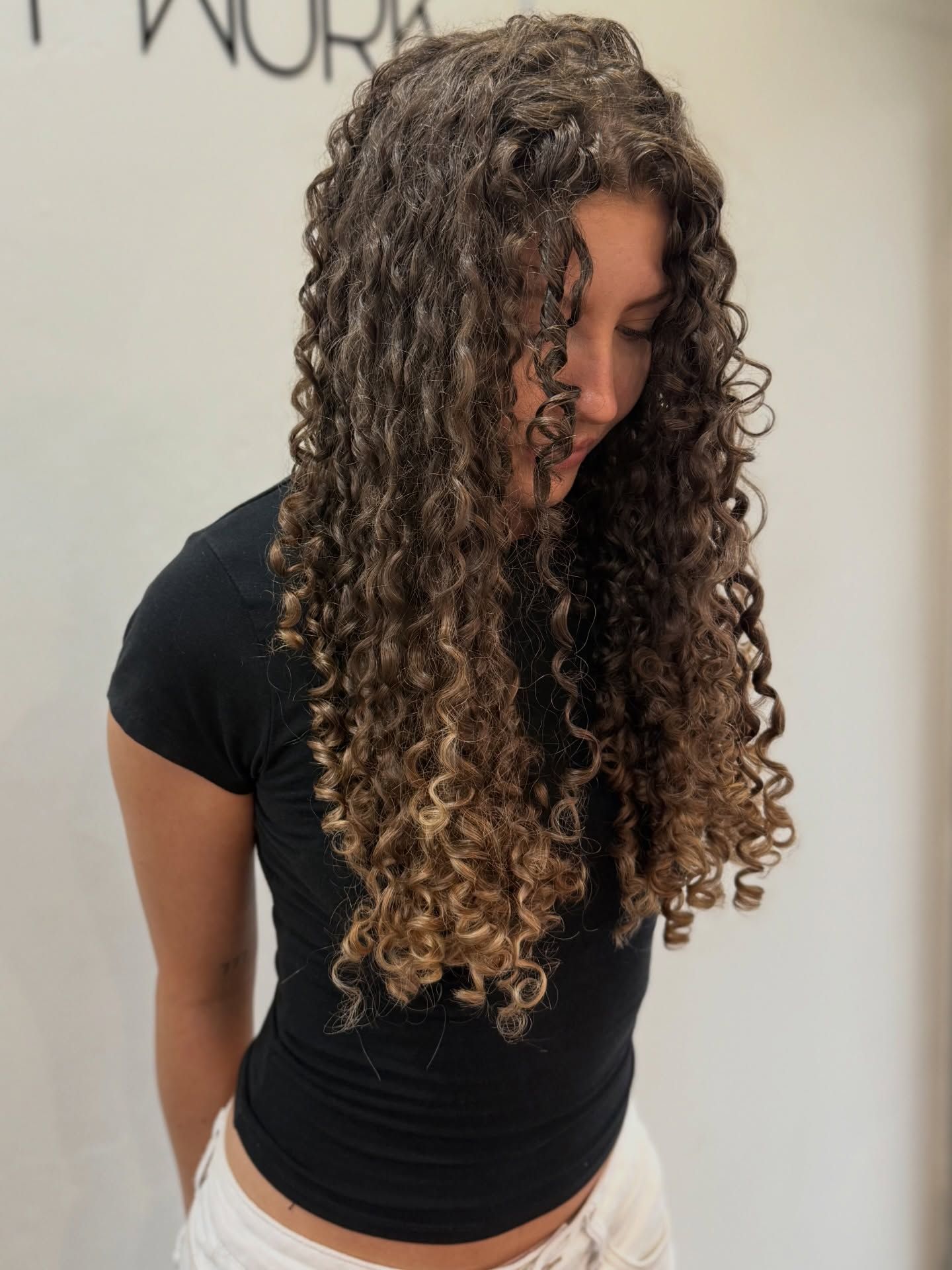 A Girl Having Her New Hair Color in the Salon — Hairdressers At Work in Cairns City, QLD