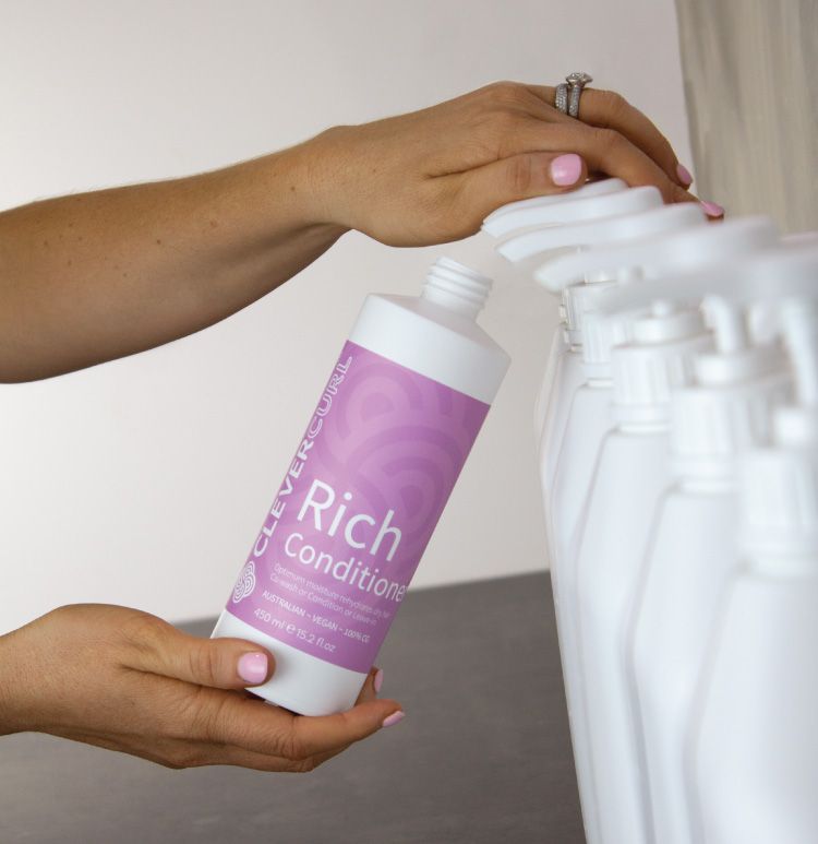 Hair Care Products — Hairdresser At Work in Cairns City, QLD