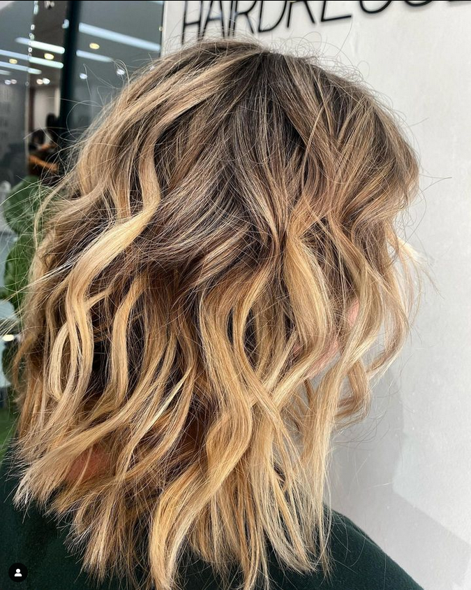 Blonde Foils — Hairdresser At Work in Cairns City, QLD
