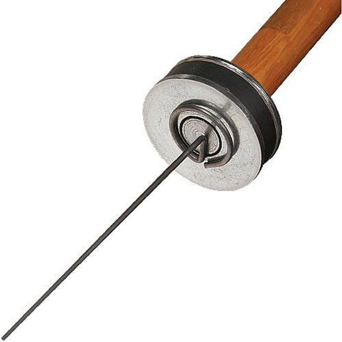 Cross-section of a wooden-handled needle holder with a long metal needle tip