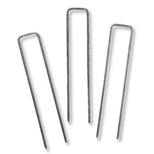 Three silver U-shaped metal hairpins on a white background