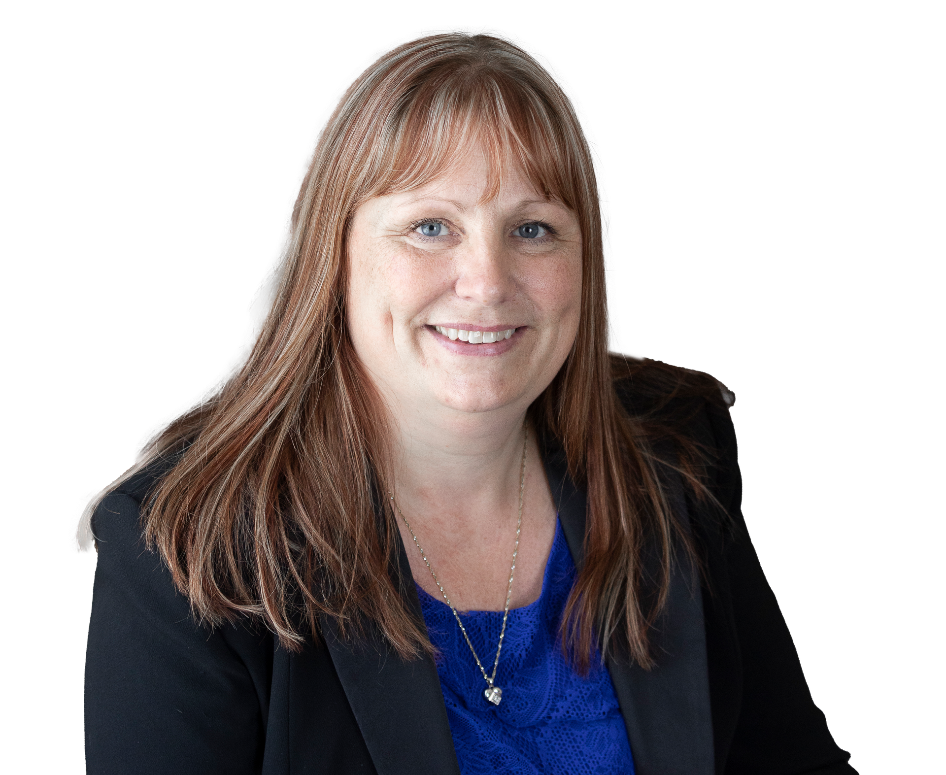 A smiling woman with shoulder-length reddish-brown hair, wearing a blue top under a black blazer and a silver pendant.