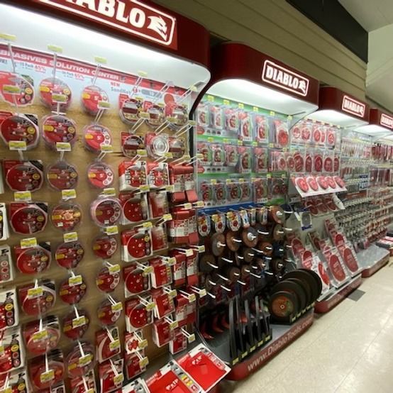 Aldi store aisle with Diablo-branded kitchenware and cookware displayed on shelves