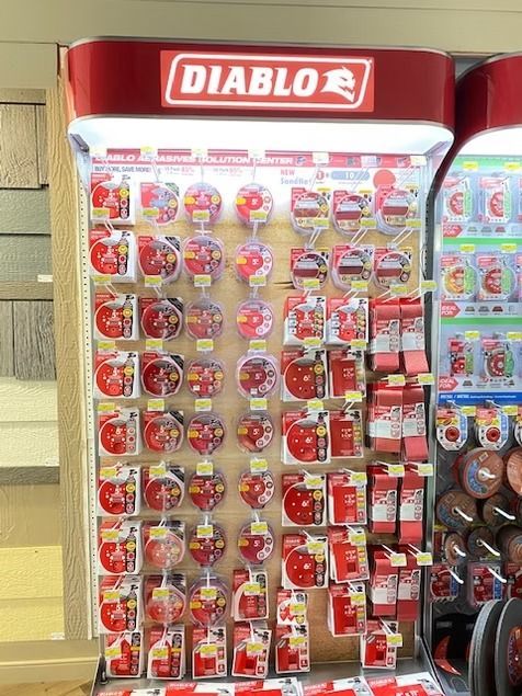 Diablo candy display with rows of red-and-white packaged sweets in a store aisle