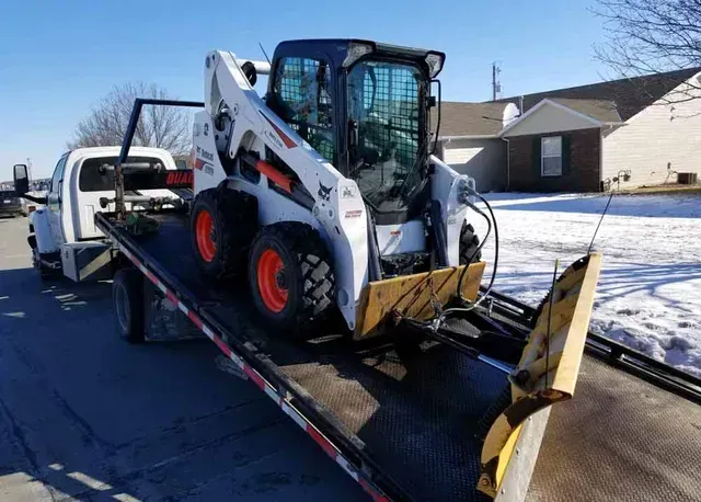Towed Bulldozer — Manhattan, KS — Affordable Towing and Auto Sales Towed Bulldozer — Manhattan, KS — Affordable Towing and Auto Sales