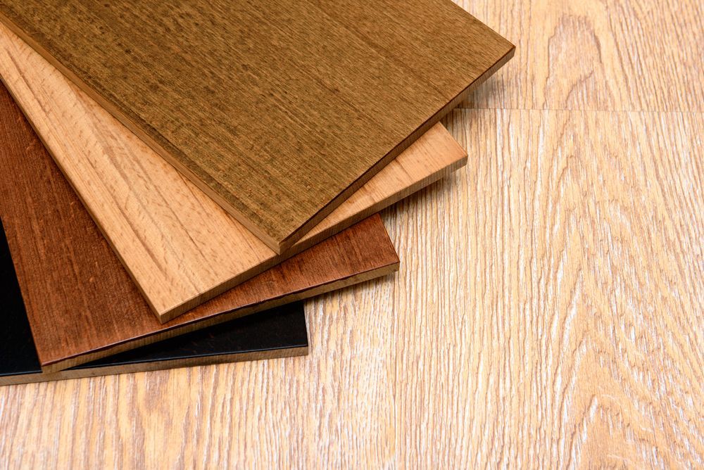 Three Different Types of Wood Are Stacked on Top — John Chisholm Flooring in Innisfail, QLD