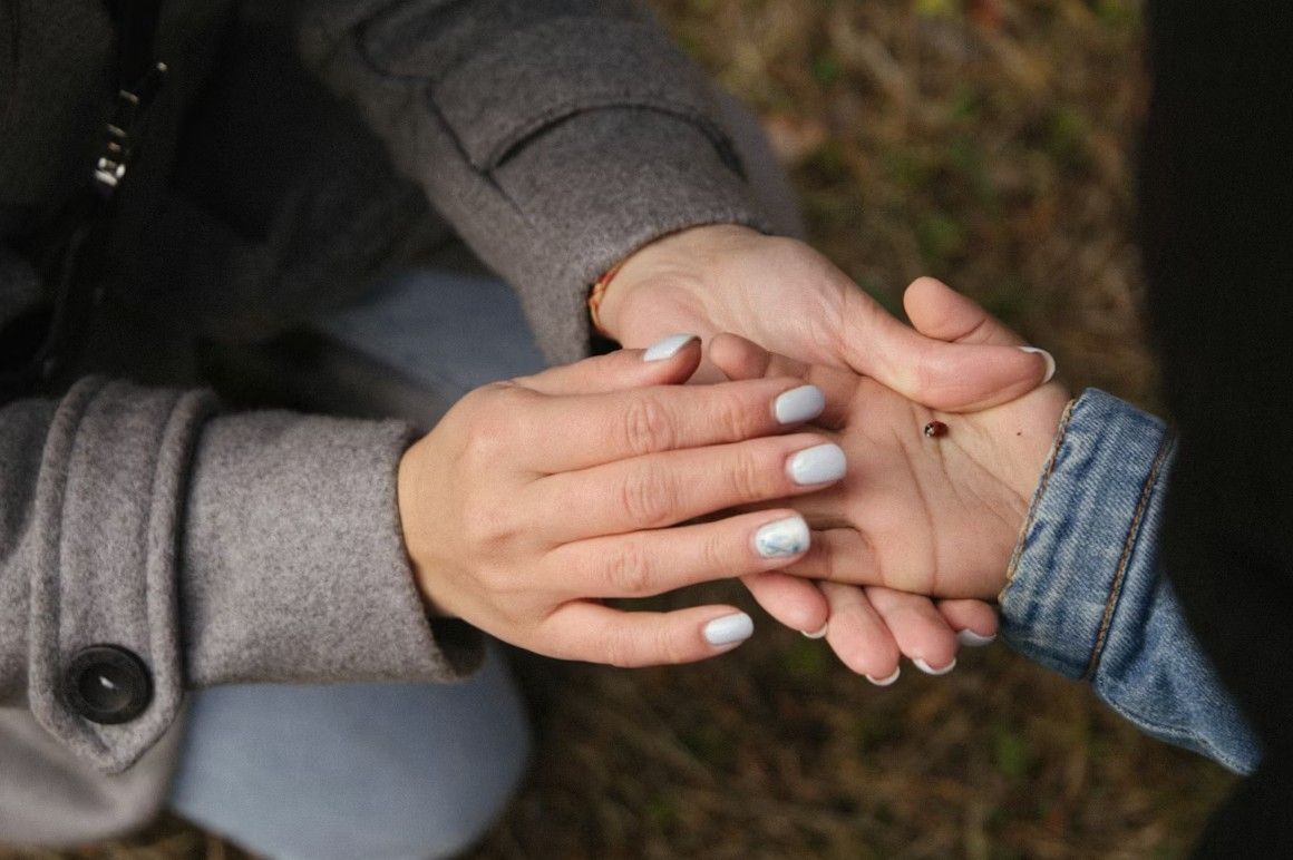 Caring hands offering comfort, reflecting a team you can trust for funeral and cremation services in River Grove, IL