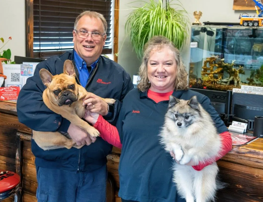 Karin and Bob Owners With the Dogs - 808 Automotive Inc.
