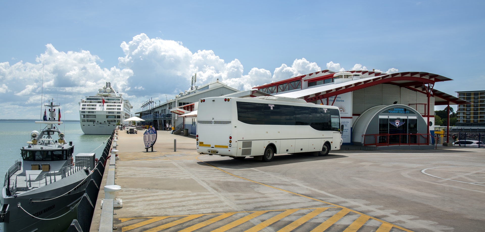 Coach Charters Australia coach beside Darwin harbour
