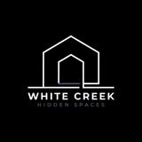White Creek Hidden Spaces logo with a white house outline on a black background