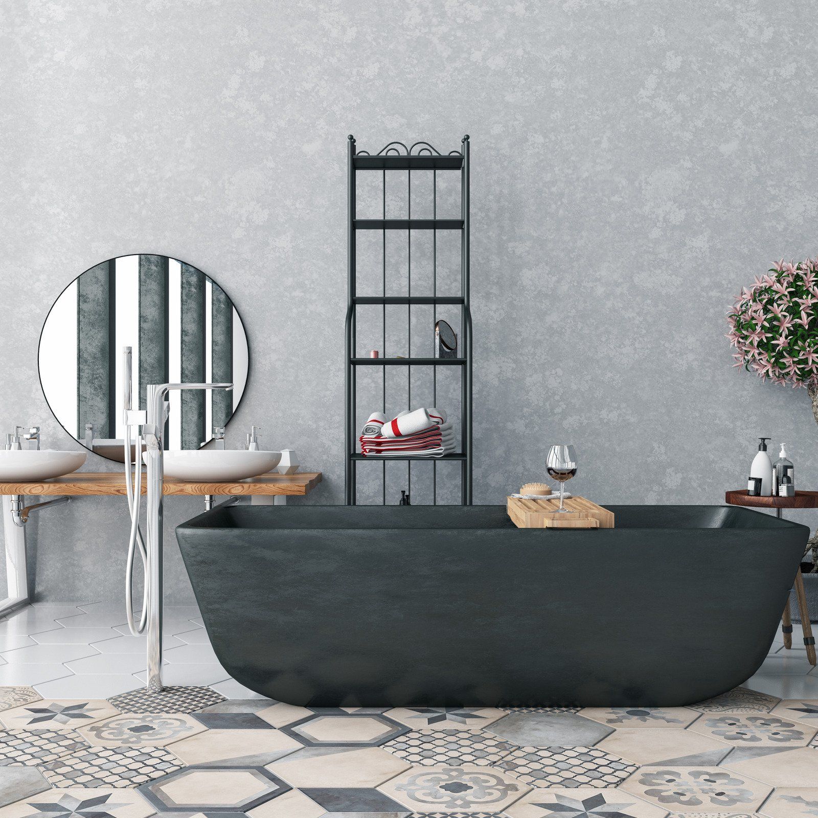 Bathroom with a dark soaking tub, round mirror, and patterned tile floor.