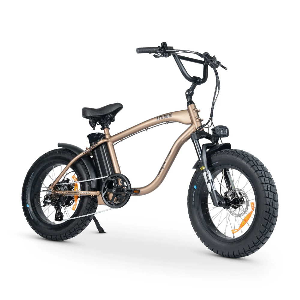 Gold-colored electric fat tire bicycle with black tires, handlebars, and seat, set against a white background. — EVA Motors in Paget, QLD