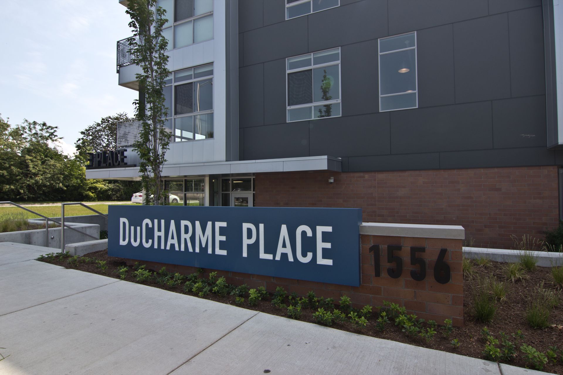 DuCharme Place - Apartment sign