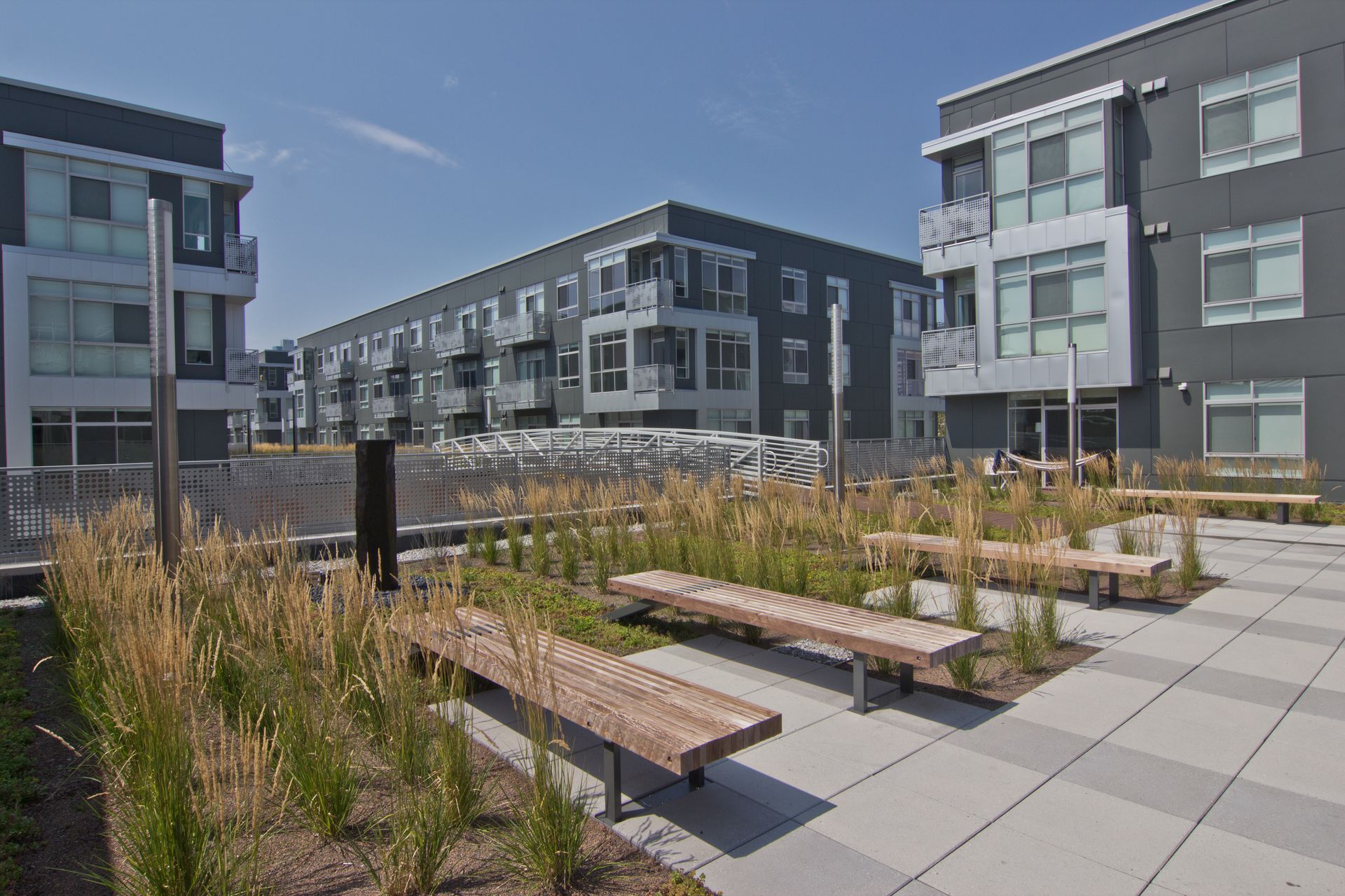 DuCharme Place -  Front  Apartment exterior and outdoor area and bench