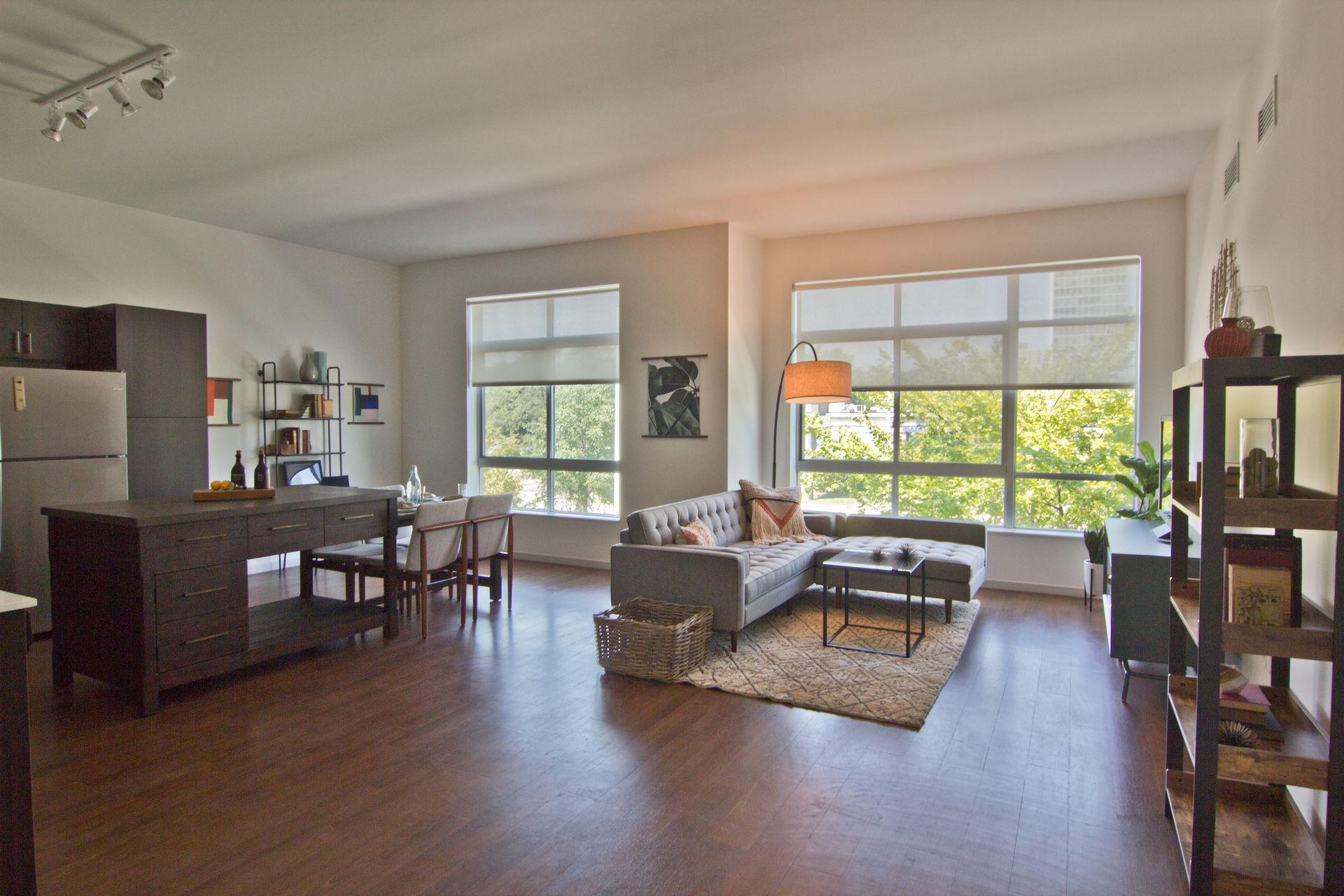 Living room dining table ,  sofa and large windows