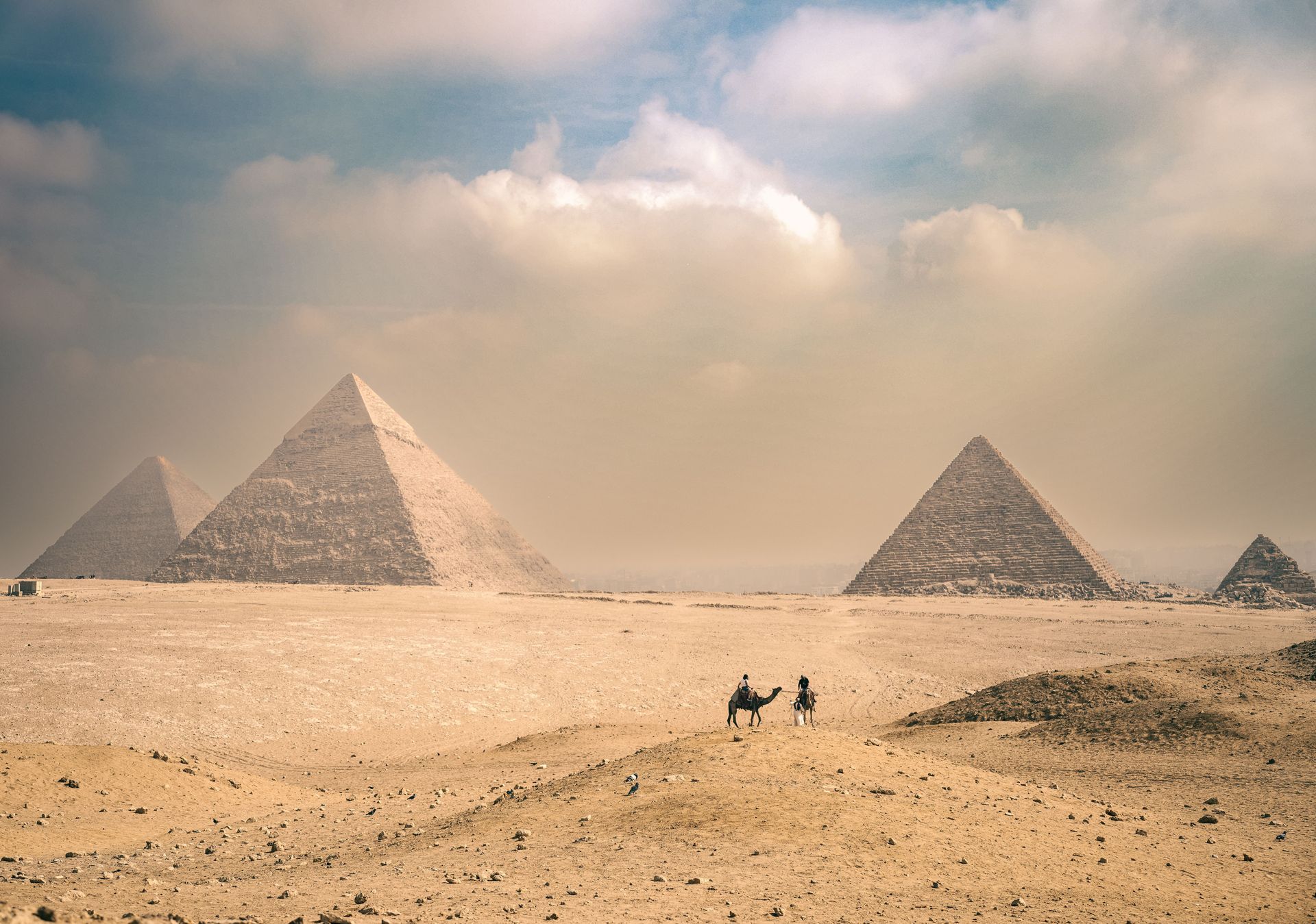 Shakira performing at the Giza Pyramids during a 2026 Egypt concert surrounded by ancient monuments
