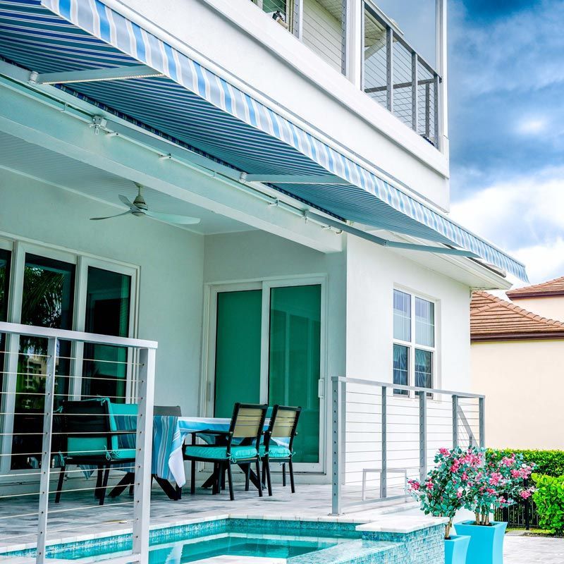 Retractable Patio Awning Creating Comfortable Outdoor Shade in College Station, TX
