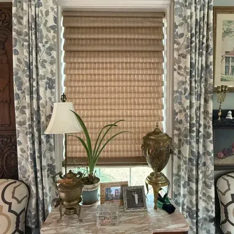 Freestanding Bathtub Paired with a Decorative Roman Shade in a College Station, TX, Bathroom
