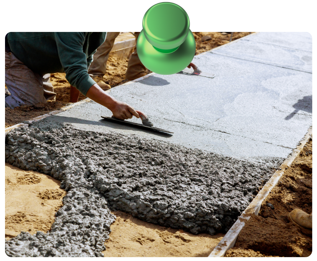 Residential driveway installation with concrete mixer truck parked curbside