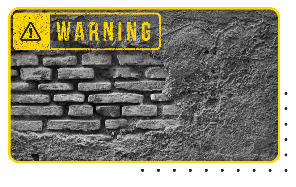 Retaining wall installation beside sloped backyard in Islip residential property