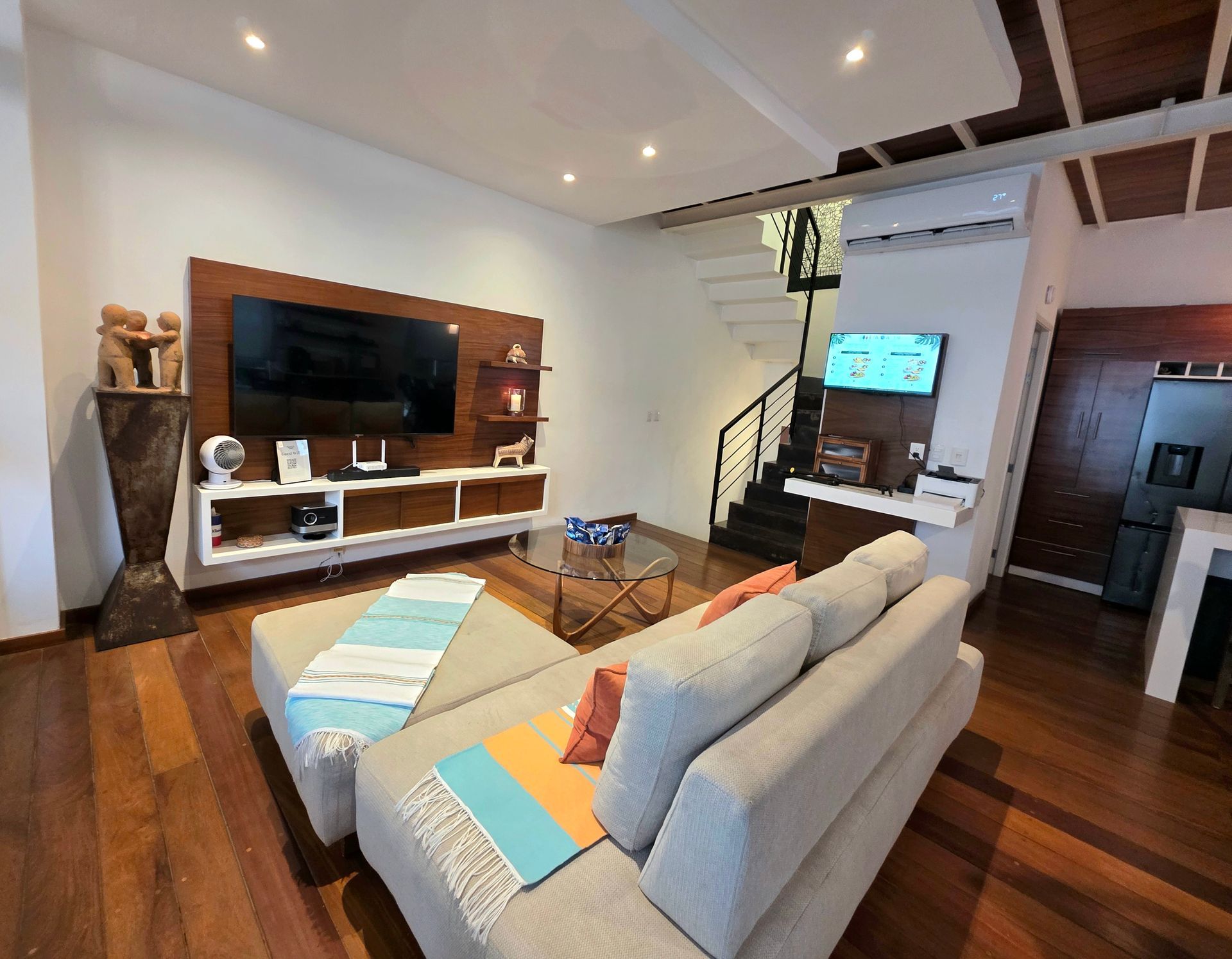 Wood cabinetry and open shelving on the main floor of AVA19 in Puerto Vallarta