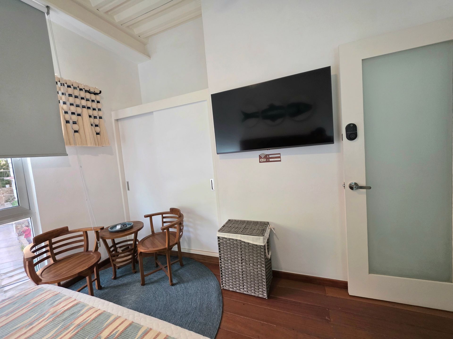 Twin Tide bedroom showing the king bed, windows and seating area