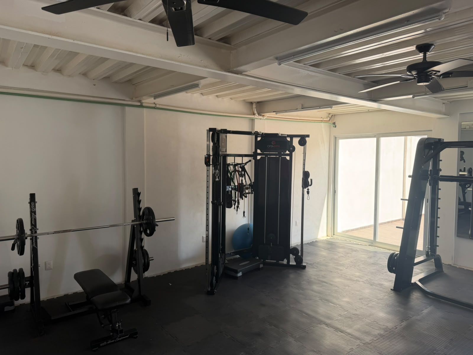 Weight bench and barbell in the AVA complex gym in Puerto Vallarta