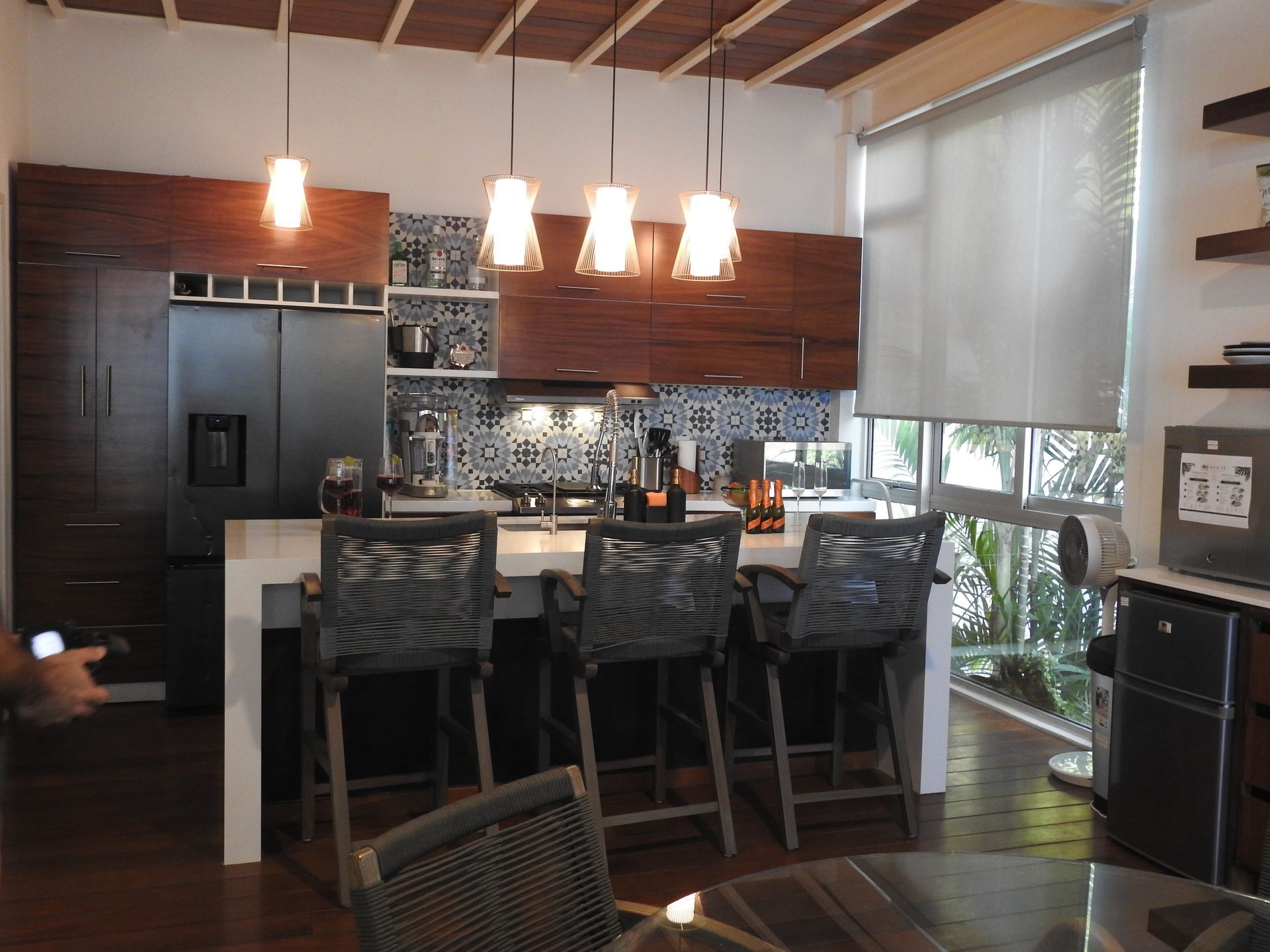 Kitchen island and bar stools on the main floor of AVA19 in Puerto Vallarta