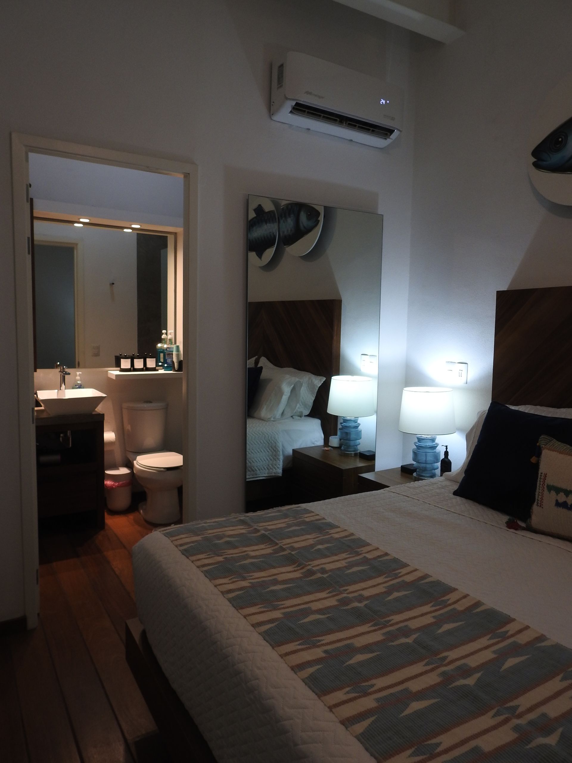Twin Tide bedroom with its private ensuite visible through the doorway