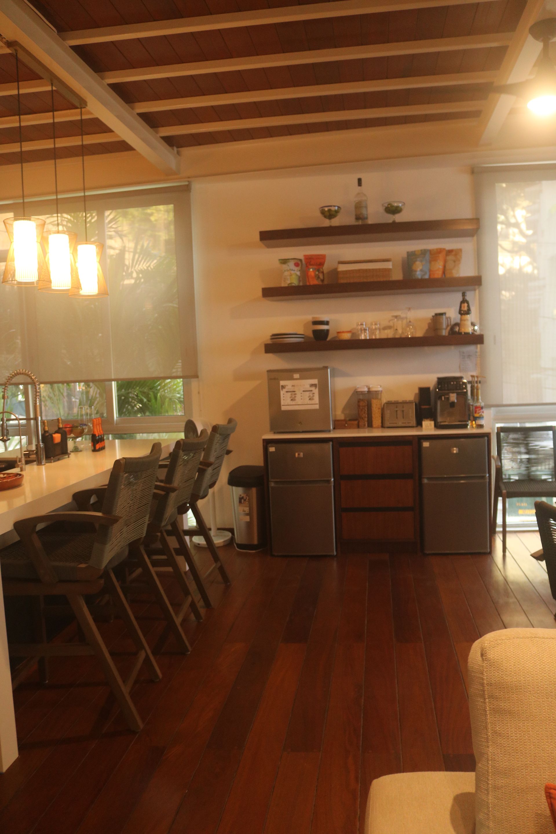 Kitchen island and refrigerator at AVA19 in Puerto Vallarta