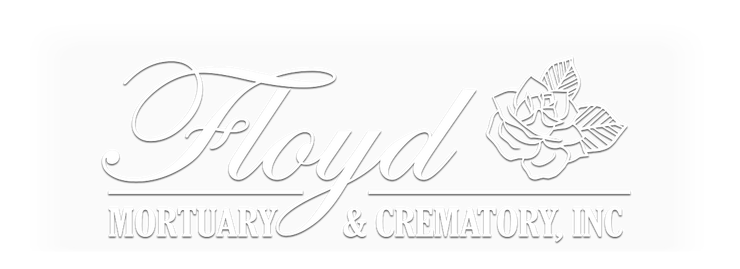 Floyd Mountain & Greenbrier, NC logo with cursive text and a flower emblem