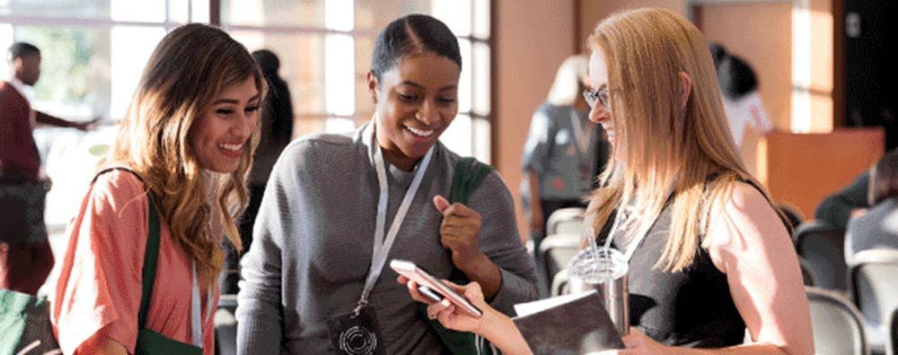 Counselors sharing notes at a conference