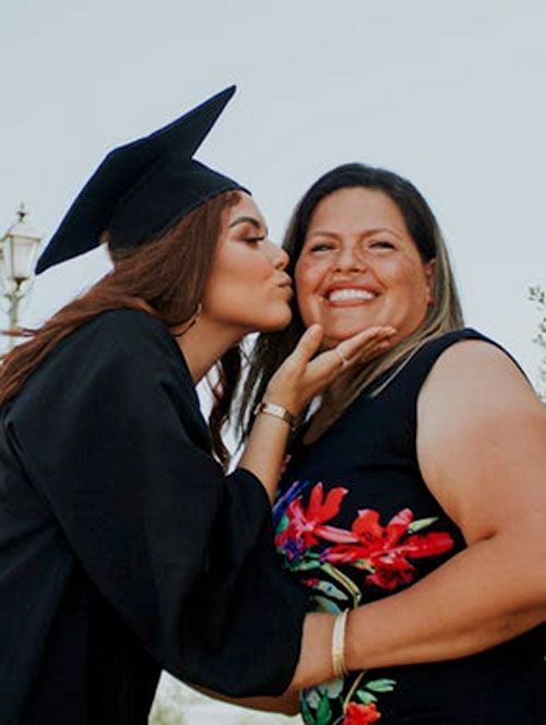 Graduate celebrating with mom