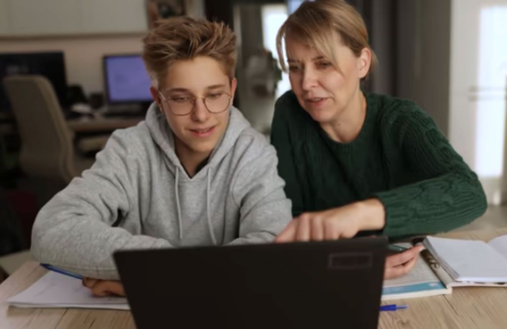 A student and parent sharing a moment together