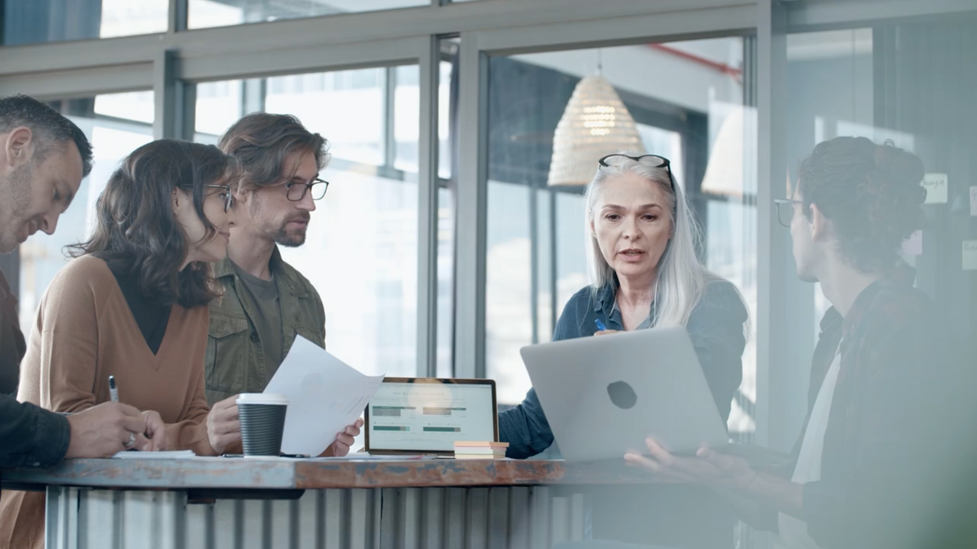 A practice owner leading her counseling team through a strategy review