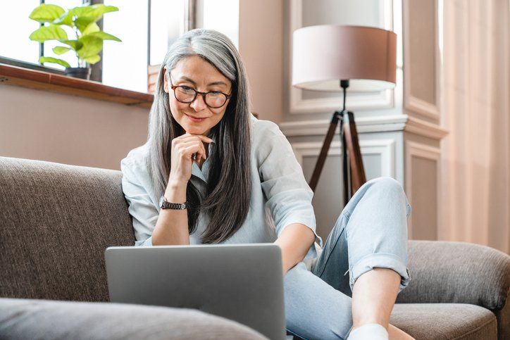 Counselor at a laptop, planning strategy