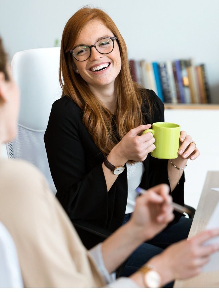 Two counselors taking a coffee break together