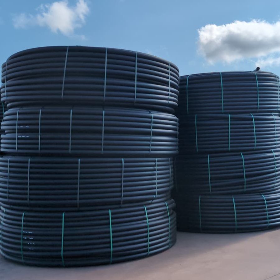 Elsam poly pipe coils stacked in the Livingstone yard
