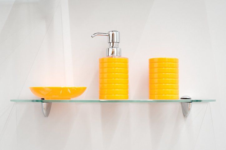 glass shelve holding soap
