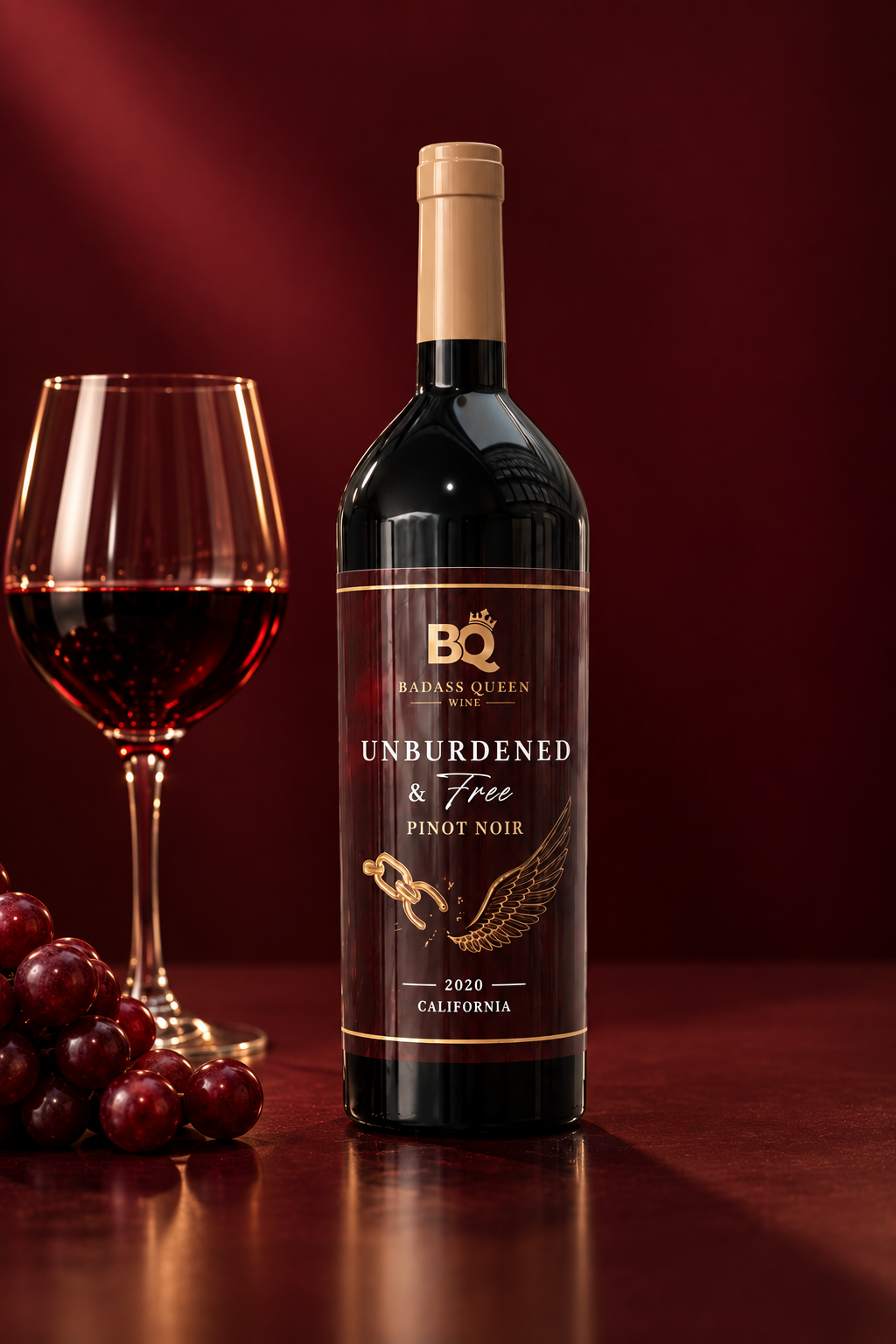 Bottle of red wine beside a filled wine glass and grapes on a dark red backdrop