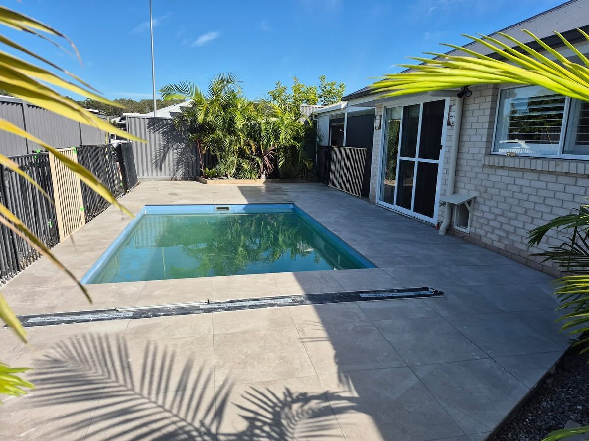 Backyard Patio with A Small Rectangular Pool — New Vision Pools in Bonny Hills, NSW